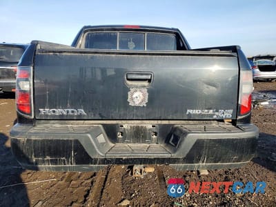 Zdjęcie 10 z 13 samochodu: 2012 HONDA RIDGELINE SPORT VIN:5FPYK1F72CB455579 - miniatura