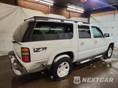 Trzecie zdjęcie samochodu z tyłu: 2004 CHEVROLET SUBURBAN K1500 VIN:3GNFK16ZX4G134684 - miniatura