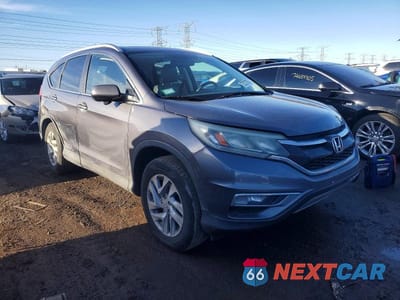Czwarte zdjęcie samochodu z boku: 2015 HONDA CR-V EXL VIN:2HKRM3H77FH501798 - miniatura