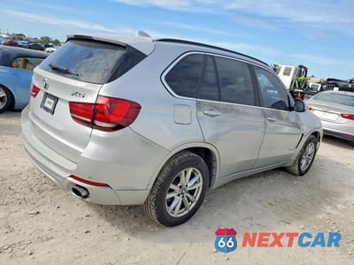 Trzecie zdjęcie samochodu z tyłu: 2014 BMW X5 SDRIVE35I VIN:5UXKR2C52E0H32429 - miniatura