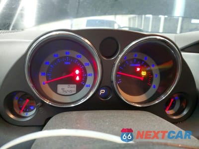 Zdjęcie 9 z 11 samochodu: 2009 MITSUBISHI ECLIPSE GS VIN:4A3AK24F29E025357 - miniatura