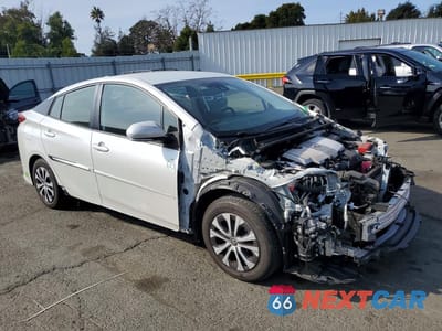 Czwarte zdjęcie samochodu z boku: 2022 TOYOTA PRIUS PRIME LE VIN:JTDKAMFP4N3226288 - miniatura