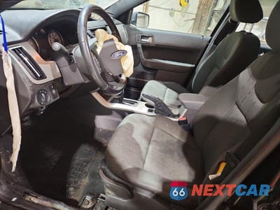 Zdjęcie 7 z 13 samochodu: 2008 FORD FOCUS SE VIN:1FAHP35N48W256063 - miniatura