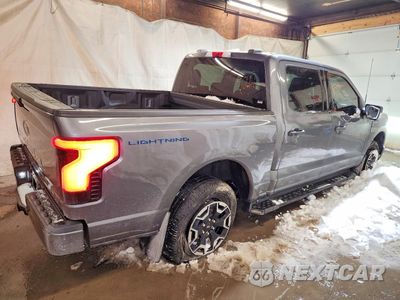 Trzecie zdjęcie samochodu z tyłu: 2023 FORD F150 LIGHTNING PRO VIN:1FTVW1ELXPWG05356 - miniatura