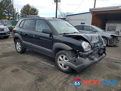 Czwarte zdjęcie samochodu z boku: 2005 HYUNDAI TUCSON GLS VIN:KM8JN72D25U132610 - miniatura