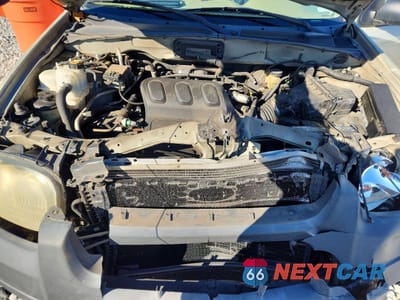 Zdjęcie 11 z 13 samochodu: 2003 FORD ESCAPE XLT VIN:1FMYU03173KA81045 - miniatura