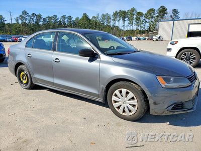 Czwarte zdjęcie samochodu z boku: 2014 VOLKSWAGEN JETTA BASE VIN:3VW2K7AJ1EM293167 - miniatura