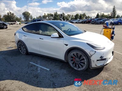 Czwarte zdjęcie samochodu z boku: 2023 TESLA MODEL Y VIN:7SAYGDEF0PF589567 - miniatura