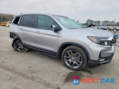 Czwarte zdjęcie samochodu z boku: 2023 HONDA PASSPORT EXL VIN:5FNYF8H55PB027867 - miniatura