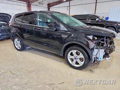 Czwarte zdjęcie samochodu z boku: 2017 FORD ESCAPE SE VIN:1FMCU9G97HUB51993 - miniatura