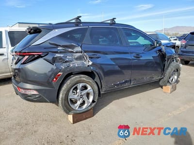 Trzecie zdjęcie samochodu z tyłu: 2023 HYUNDAI TUCSON SEL VIN:5NMJBCAE2PH288625 - miniatura