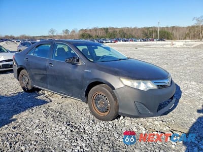 Czwarte zdjęcie samochodu z boku: 2014 TOYOTA CAMRY HYBRID VIN:4T1BD1FK1EU127248 - miniatura