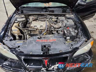 Zdjęcie 11 z 13 samochodu: 2004 PONTIAC GRAND AM GT VIN:1G2NW12E74C155625 - miniatura