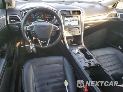 Zdjęcie 8 z 12 samochodu: 2017 FORD FUSION SE HYBRID VIN:3FA6P0LU5HR409312 - miniatura