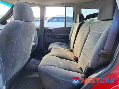 Zdjęcie 11 z 14 samochodu: 1996 JEEP GRAND CHEROKEE LAREDO VIN:1J4GZ58S9TC276195 - miniatura