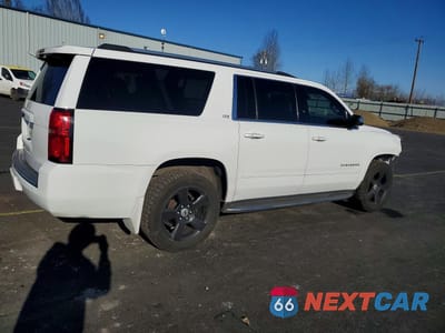 Trzecie zdjęcie samochodu z tyłu: 2016 CHEVROLET SUBURBAN K1500 LTZ VIN:1GNSKJKC0GR240517 - miniatura