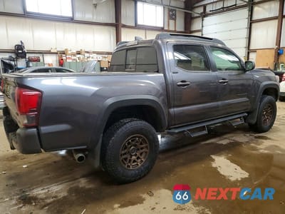 Trzecie zdjęcie samochodu z tyłu: 2023 TOYOTA TACOMA DOUBLE CAB VIN:3TYCZ5AN8PT166000 - miniatura