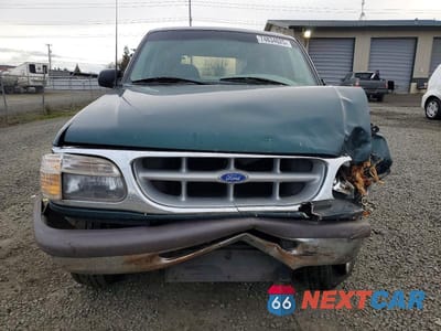 Piąte zdjęcie samochodu w środku: 1997 FORD EXPLORER VIN:1FMDU34X1VZA53898 - miniatura