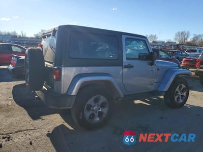 Trzecie zdjęcie samochodu z tyłu: 2016 JEEP WRANGLER SAHARA VIN:1C4AJWBG0GL307823 - miniatura