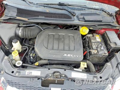 Zdjęcie 12 z 15 samochodu: 2014 DODGE GRAND CARAVAN SXT VIN:2C4RDGCG6ER259201 - miniatura