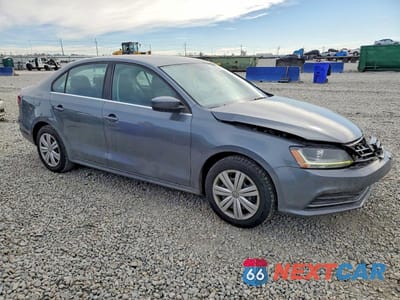 Czwarte zdjęcie samochodu z boku: 2017 VOLKSWAGEN JETTA S VIN:3VW2B7AJ8HM392301 - miniatura