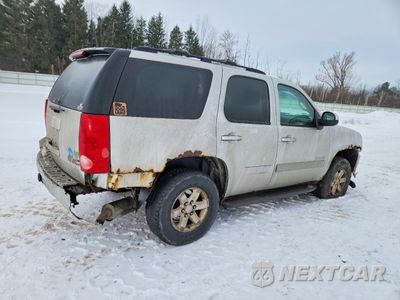 Trzecie zdjęcie samochodu z tyłu: 2011 GMC YUKON SLE VIN:1GKS2AE0XBR261480 - miniatura
