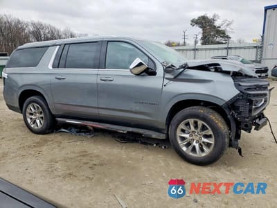 Czwarte zdjęcie samochodu z boku: 2026 CHEVROLET SUBURBAN K1500 PREMIER VIN:1GNS6FKD5TR104646 - miniatura