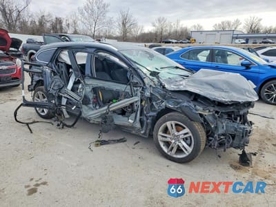 Czwarte zdjęcie samochodu z boku: 2015 VOLVO V60 PREMIER VIN:YV140MEB4F1196069 - miniatura