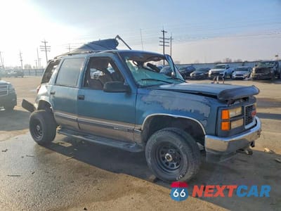 Czwarte zdjęcie samochodu z boku: 1995 GMC YUKON VIN:1GKEK13K3SJ764641 - miniatura