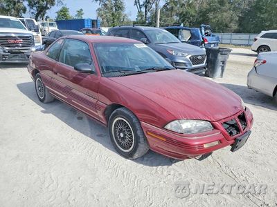 Czwarte zdjęcie samochodu z boku: 1993 PONTIAC GRAND AM SE VIN:1G2NE1439PM602615 - miniatura