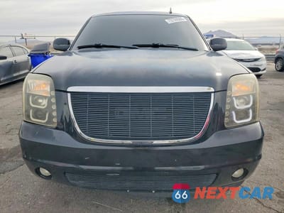Piąte zdjęcie samochodu w środku: 2011 GMC YUKON VIN:1GKS2EEF3BR333356 - miniatura