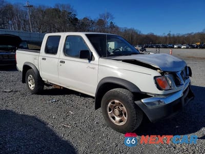 Czwarte zdjęcie samochodu z boku: 2000 NISSAN FRONTIER CREW CAB XE VIN:1N6ED27TXYC427537 - miniatura