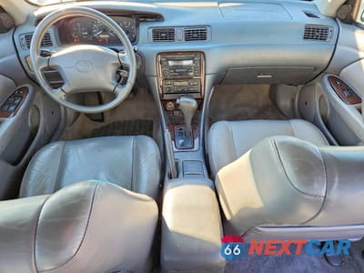 Zdjęcie 8 z 11 samochodu: 2000 TOYOTA CAMRY VIN:4T1BF28K0YU092767 - miniatura