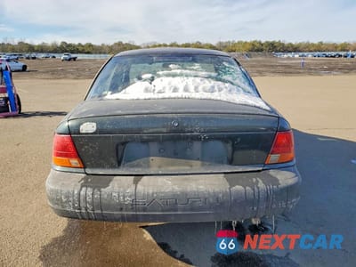 Zdjęcie 6 z 12 samochodu: 1999 SATURN SL1 VIN:1G8ZH5286XZ291684 - miniatura