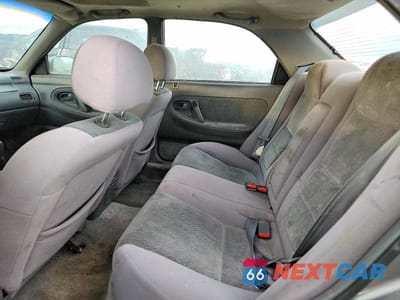Zdjęcie 10 z 11 samochodu: 1997 MAZDA 626 ES VIN:1YVGE22D4V5633245 - miniatura
