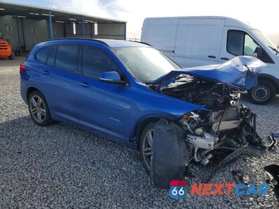 Czwarte zdjęcie samochodu z boku: 2016 BMW X1 XDRIVE28I VIN:WBXHT3C3XG5E47956 - miniatura