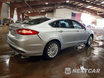 Trzecie zdjęcie samochodu z tyłu: 2013 FORD FUSION SE HYBRID VIN:3FA6P0LU3DR219034 - miniatura