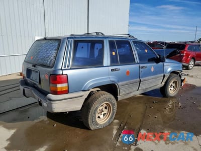 Trzecie zdjęcie samochodu z tyłu: 1995 JEEP GRAND CHEROKEE LAREDO VIN:1J4GZ58SXSC605565 - miniatura