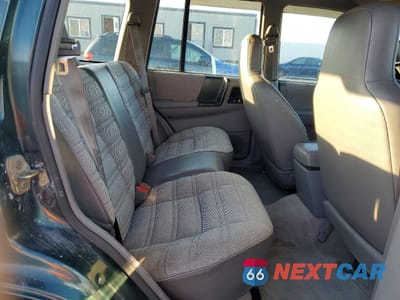 Zdjęcie 11 z 14 samochodu: 1993 JEEP GRAND CHEROKEE VIN:1J4GZ68SXPC582043 - miniatura