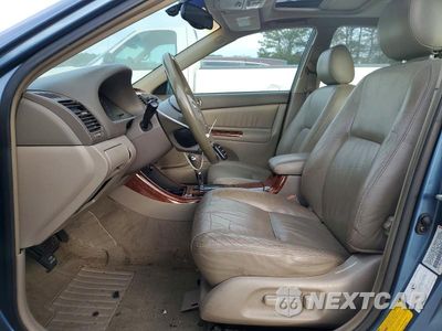 Zdjęcie 7 z 11 samochodu: 2002 TOYOTA CAMRY LE VIN:JTDBF30K420019955 - miniatura