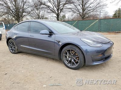 Czwarte zdjęcie samochodu z boku: 2021 TESLA MODEL 3 VIN:5YJ3E1EB1MF979257 - miniatura