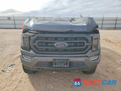 Piąte zdjęcie samochodu w środku: 2021 FORD F150 VIN:1FTFW1E81MFB42082 - miniatura