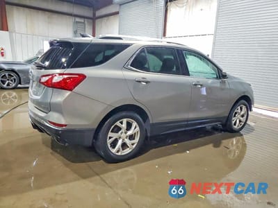 Trzecie zdjęcie samochodu z tyłu: 2018 CHEVROLET EQUINOX LT VIN:3GNAXTEX7JS625293 - miniatura