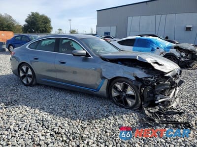 Czwarte zdjęcie samochodu z boku: 2023 BMW I4 EDRIVE 35 VIN:WBY43AW02PFR32969 - miniatura
