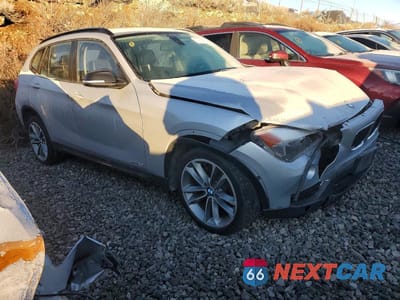 Czwarte zdjęcie samochodu z boku: 2014 BMW X1 VIN:WBAVL1C53EVY10014 - miniatura