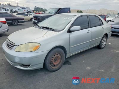 2003 TOYOTA COROLLA LE JTDBR32E030021668 - główne zdjęcie licytacji z USA - miniatura