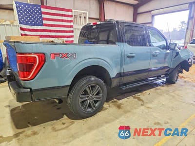 Trzecie zdjęcie samochodu z tyłu: 2023 FORD F150 SUPERCREW VIN:1FTFW1E86PKD82630 - miniatura