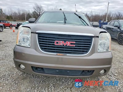 Piąte zdjęcie samochodu w środku: 2012 GMC YUKON VIN:1GKS1CE06CR218917 - miniatura