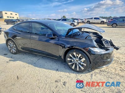 Czwarte zdjęcie samochodu z boku: 2024 TESLA MODEL 3 VIN:5YJ3E1EAXRF768587 - miniatura