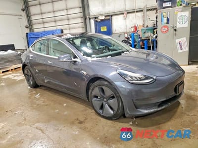 Czwarte zdjęcie samochodu z boku: 2018 TESLA MODEL 3 VIN:5YJ3E1EB4JF110261 - miniatura